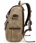 Side view of Rugged Batik Waterproof Canvas Camera Backpack With Large Capacity Main Camera Compartment And Anti Theft Rear Access