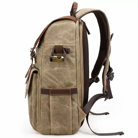 Side view of Rugged Batik Waterproof Canvas Camera Backpack With Large Capacity Main Camera Compartment And Anti Theft Rear Access