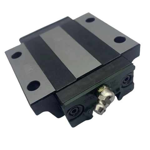 Close-up of SR25TB Linear Rail Kit carriage block for CNC machines and 3D printers, showing metal construction and smooth finish.