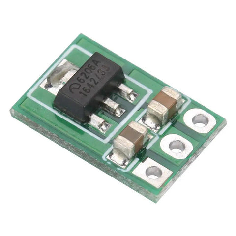 Top Shelf Step Down Voltage Converter Module For Lithium Battery Systems And Diy Electronics Projects Featuring Smooth Ldo Regulation And Dead Simple Plug And Play Operation, small green PCB with LDO chip and capacitors.