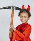 Child holding Dope Realistic 49 Cm Fake Pickaxe Prop For Halloween Cosplay And Masquerade Party Decor, smiling in red outfit