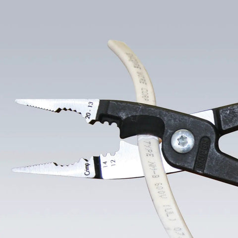 6 In 1 Electrical Installation Pliers With Dipped Red Handle cutting cable, black and silver tool gripping white insulated wire