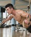 Heavy Duty Wall Mount Bracket And Ceiling Anchor Hooks For Suspension Trainer Straps in use by a muscular man in gym.