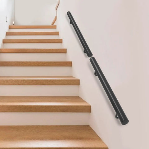 Wall Mounted Stainless Steel Handrail For Indoor Stairs Showing Off A Matte Coat And Tank Grade Build That Takes Scratches Like A Boss While Keeping Your Steps Locked Down Tight on a staircase.