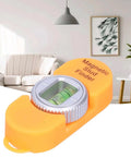 Aqur2020 Magnetic Stud Finder, Portable Wall Detector with Level Gauge (Orange) on a table in a modern living room.