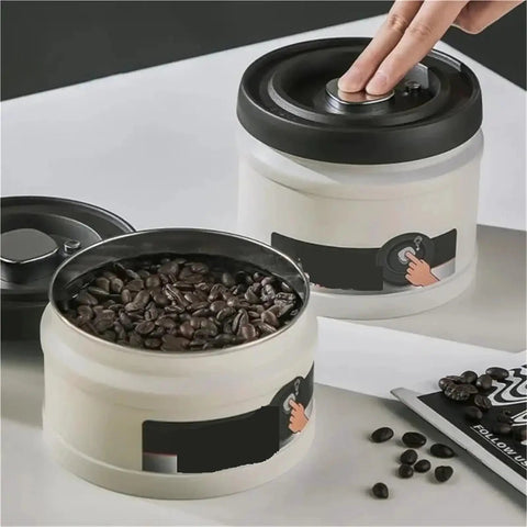 Heavy Duty Glass Storage Jars With Kickass Vacuum Seal Technology storing coffee beans on a white surface, featuring a lid and easy access.