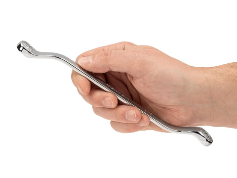 Hand holding One Half By Nine Sixteenths Inch 45 Degree Offset Box End Wrench With 12 Point Openings Built To Handle Tight Spots And Obstructions Model WBE23313 Ready To Roll