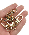 34mm Swivel Lobster Clasp Set For One Handed Operation With Smooth Locking Motion Zinc Alloy Gold Finish Snap Hook Buckles For Crossbody Purses Chains And Key Fobs 6 Pack in hand