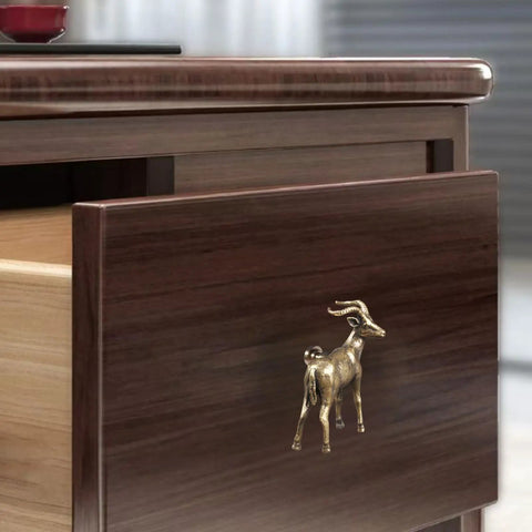 Kickass Solid Brass Cabinet Knobs With Super Sweet Retro Animal Drawer Pulls For Kitchen Cupboards Heavy Duty Furniture Hardware Featuring Smooth Adjustable Cuttable Step Screws on a wooden drawer.