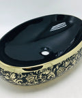 This Sleek Oval Ceramic Vessel Sink Totally Kicks Up Your Bath Game With A Premium Matte Gold Countertop Basin Delivering A Dreamy High Style Look And Super Easy Cleaning Surfaces. Black ceramic vessel sink with gold detailing, 60 cm long, designed for luxury bathrooms.