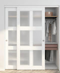 Sliding Closet Door Set 72 Inch High By 80 Inch Wide Double 37 Inch Panels With Three Lite Frosted Glass Bypass Design Includes Hardware Kit And Matching Fascia Pre Drilled Solid Wood Slab With Waterproof PVC Surface Easy Installation White installed on a closet.
