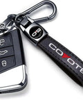 Premium Leather Car Keychain With Coyote 5 0 Emblem And Built In Screwdriver Tool Heavy Duty Alloy Ring For Ford Mustang Rides, close-up view.