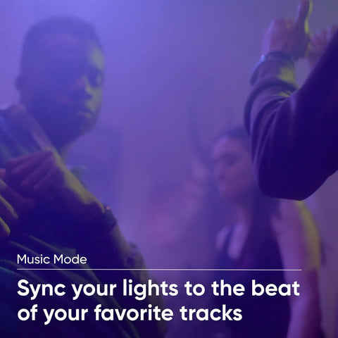 Party scene with people dancing, showcasing the 16.4ft RGB LED Light Strip With 16 Million Colors And Tunable White, Music Sync feature.