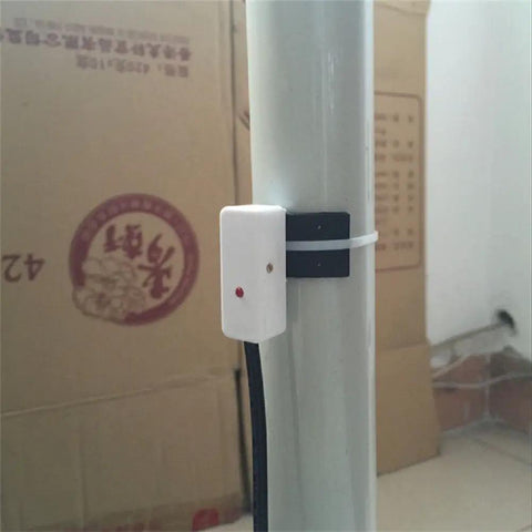 No Contact Liquid Level Sensor For Pipes And Tanks, Contactless Water Level Detection With NPN Output shown installed on a pipe
