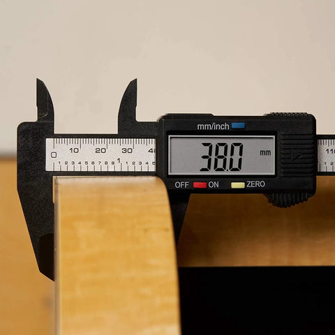 Six Inch Digital Caliper Handy Electronic Measuring Tool With Inch And Millimeter Modes measuring wooden surface