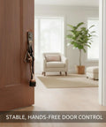 Foot Activated Door Stop With Weighted Zinc Alloy Base for hands free entry fits standard interior doors in living room setting.