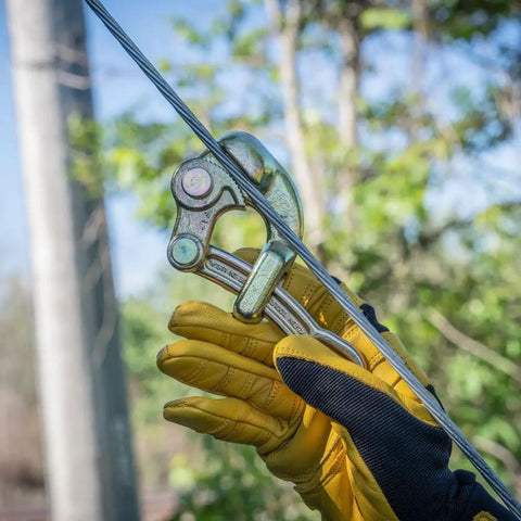 Haven's Grip Wire Pulling Tool for Wire Rope Up To 0.25 Inch in use, clamping cable outdoors, lightweight tough clamp