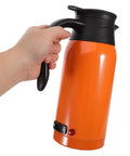 Level Up Your Road Trip Game With This 1000ml Portable Car Kettle Made From Sturdy Stainless Steel To Whip Up Fresh Hot Drinks Anywhere You Roll For Reliable Daily Commutes, shown in hand.