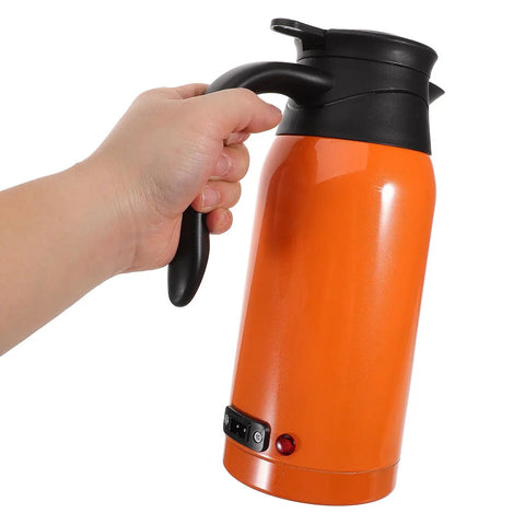 Level Up Your Road Trip Game With This 1000ml Portable Car Kettle Made From Sturdy Stainless Steel To Whip Up Fresh Hot Drinks Anywhere You Roll For Reliable Daily Commutes, shown in hand.