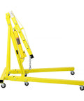 Pro Level 2 Ton Hydraulic Engine Hoist And Folding Cherry Picker Shop Crane With 4000 Lb Capacity side view of yellow hoist with swivel casters.