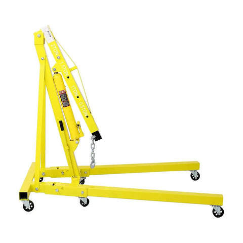 Pro Level 2 Ton Hydraulic Engine Hoist And Folding Cherry Picker Shop Crane With 4000 Lb Capacity side view of yellow hoist with swivel casters.