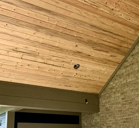 Ponderosa Premium Interior Wood Aging Stain 5 Gallon Container used on light wood shiplap ceiling, enhancing natural grain.