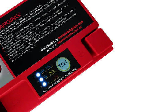 Close-up of Lithium YTZ5S Battery Replacement for Honda Grom MSX125 and Kawasaki Z125 with High Crank Power, showing charge indicator.
