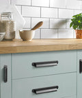 Six Pack Black Cabinet Cup Pulls And Drawer Handles, 5.04 Inch Center To Center Zinc Alloy Bar Pulls, installed on kitchen cabinet
