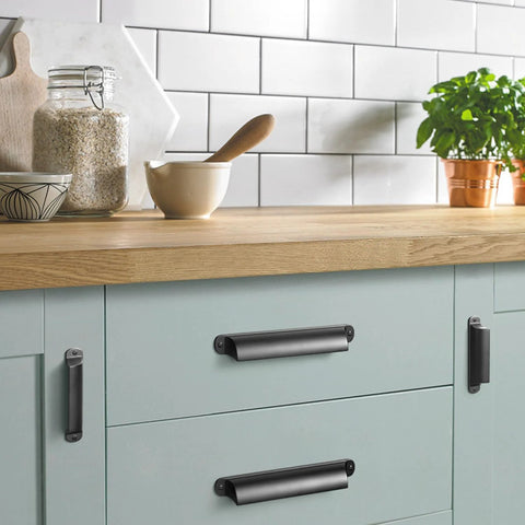 Six Pack Black Cabinet Cup Pulls And Drawer Handles, 5.04 Inch Center To Center Zinc Alloy Bar Pulls, installed on kitchen cabinet