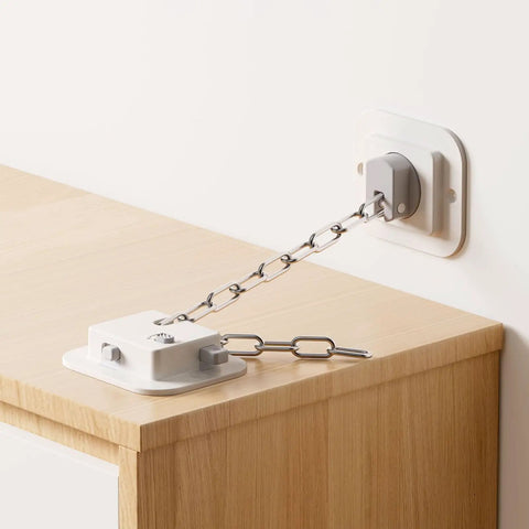 No Drill Anti Tip Furniture Anchor Kit with 3M Adhesive and adjustable steel cable securing furniture to wall.