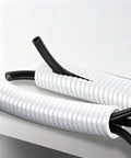 Heavy Duty PA66 Nylon Corrugated Conduit With Flame Resistant Sheathing For Zero Hassle Cable Routing and Bulletproof Wire Protection Across All Applications, flexible tubes with black cables.