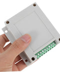Tough Yet Compact Weatherproof Junction Box For Industrial Use shown held in hand, ABS plastic, gray, compact size, power supply enclosure.