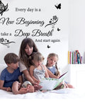 Every Day Is A New Beginning Inspirational Wall Art Sticker Set in living room with mom reading to three kids
