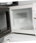 Open microwave showing installed 10 Piece Mica Insulation Sheets For Microwave Ovens, heat resistant waveguide cover inside compartment.