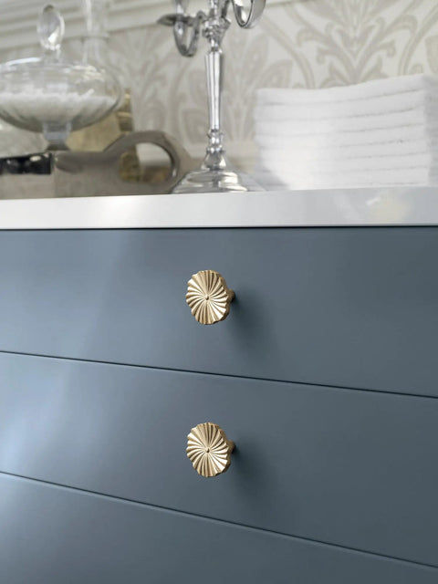 Close-up of dresser with 6 Pack Zinc Alloy Drawer Knobs Champagne Bronze Cabinet Knobs With Flower Design installed, showing elegant look.