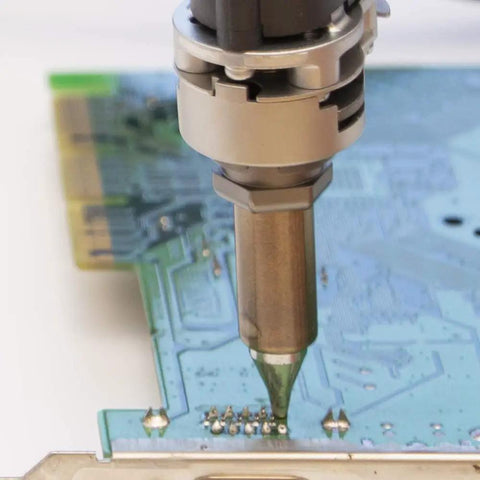 N61-10 Desoldering Nozzle 1.6mm Quick Change Tip removing solder from circuit board with precision.