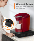 Person using K Cup Drawer Organizer With Sliding Tray And Pull Out Pod Holder Rolling Stand For Keurig Countertop Coffee Pod Storage