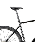 Aluminum Bike Seat Post Shim 22.2mm To 25.4mm 60mm Length Reduction Sleeve on mountain bike, side view.