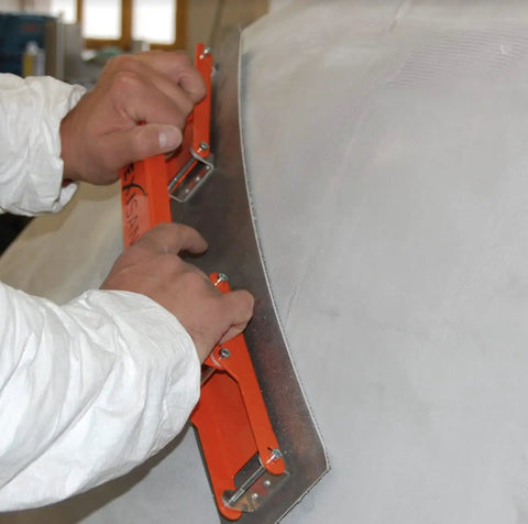 Flexisander Hand Held Flexible Sanding Block for Curved and Flat Surfaces in use on curved surface