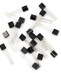 General Purpose Transistor Kit With 400 Pieces In TO92 And MOSFETs scattered on white background