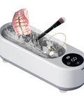 This Slick Little Ultrasonic Cleaner Machine Packs A Serious Punch With A Roomy 300 ML Tank, perfect for cleaning teeth, brushes, and jewelry.