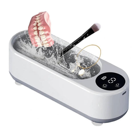 This Slick Little Ultrasonic Cleaner Machine Packs A Serious Punch With A Roomy 300 ML Tank, perfect for cleaning teeth, brushes, and jewelry.