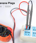 Heavy Duty Electrical Multimeter Test Leads Kit With Alligator Clips, Hooks And Probes, 1000V CAT II, 10A, plugged into power strip