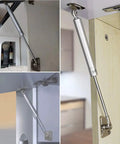 Heavy Duty 10 Inch Gas Struts 2 Pack Soft Close Cabinet Lift Supports mounted on cabinets for silent operation and smooth support.