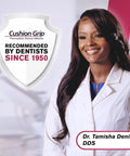 Dentist in white coat with Cushion Grip badge, recommended by dentists since 1950