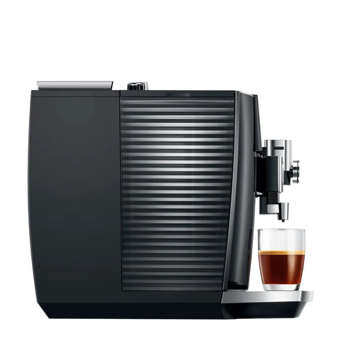 Hella Smooth Super Automatic Bean To Cup Coffee Maker Featuring Integrated Twin Boiler And Sweet Foam Dispenser Setup Plus Huge Angled Touchscreen Panel For A Slick Kitchen Flex On Demand, side view with espresso cup.