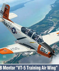 1/48 USN T-34B Mentor Model Kit Unpainted, DIY Friendly Build, VT-5 Training Air Wing Theme, Detailed Panel Lines And Cockpit With Etched Parts, Glue And Paints Sold Separately flying over landscape.