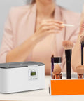 Ultrasonic Jewelry Cleaner 600ml Sonic Cleaner With Digital Timer next to makeup brushes on a table