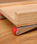 Top Shelf Set Of Four Stainless Steel Cabinet Door Rollers Paired With Heavy Duty Galvanized Track And Durable Plastic Gliders For Smooth As Butter Bottom Casters attached to wood board.