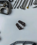 Heavy Duty Replacement Crimping Die For Wire Crimper Machine High Carbon Steel Terminal Tool Die on a workspace with tools.